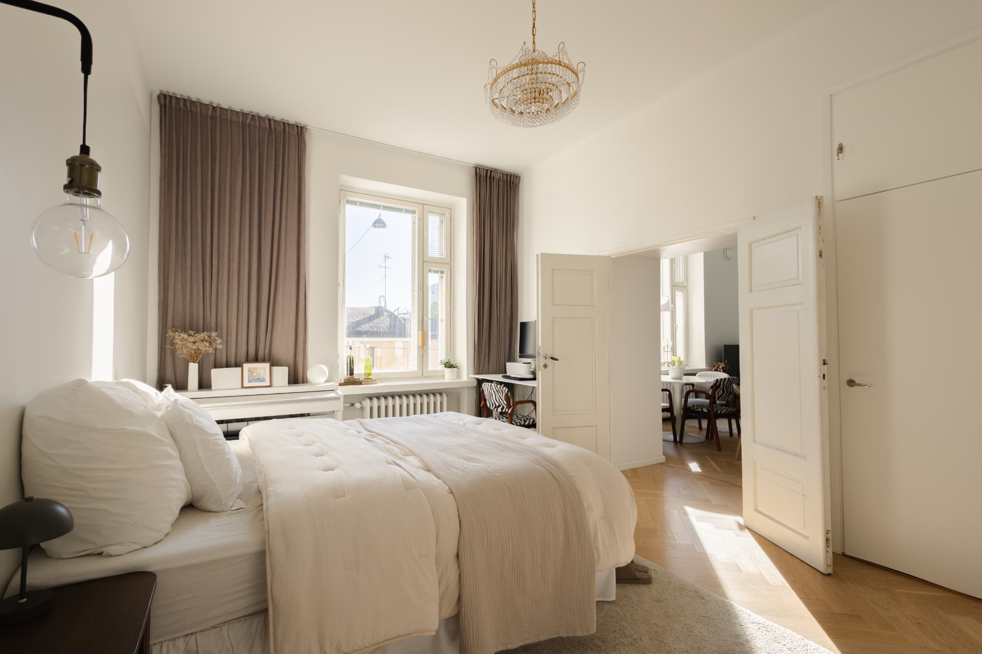 Sunlit rental bedroom in Helsinki